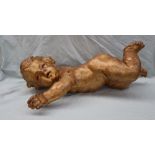 An 18th century gilt gesso cherub, with arms outstretched,