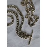 A silver Albert watch chain together with a silver necklace,