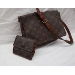 A Louis Vuitton monogram clutch bag, with a leather shoulder strap,