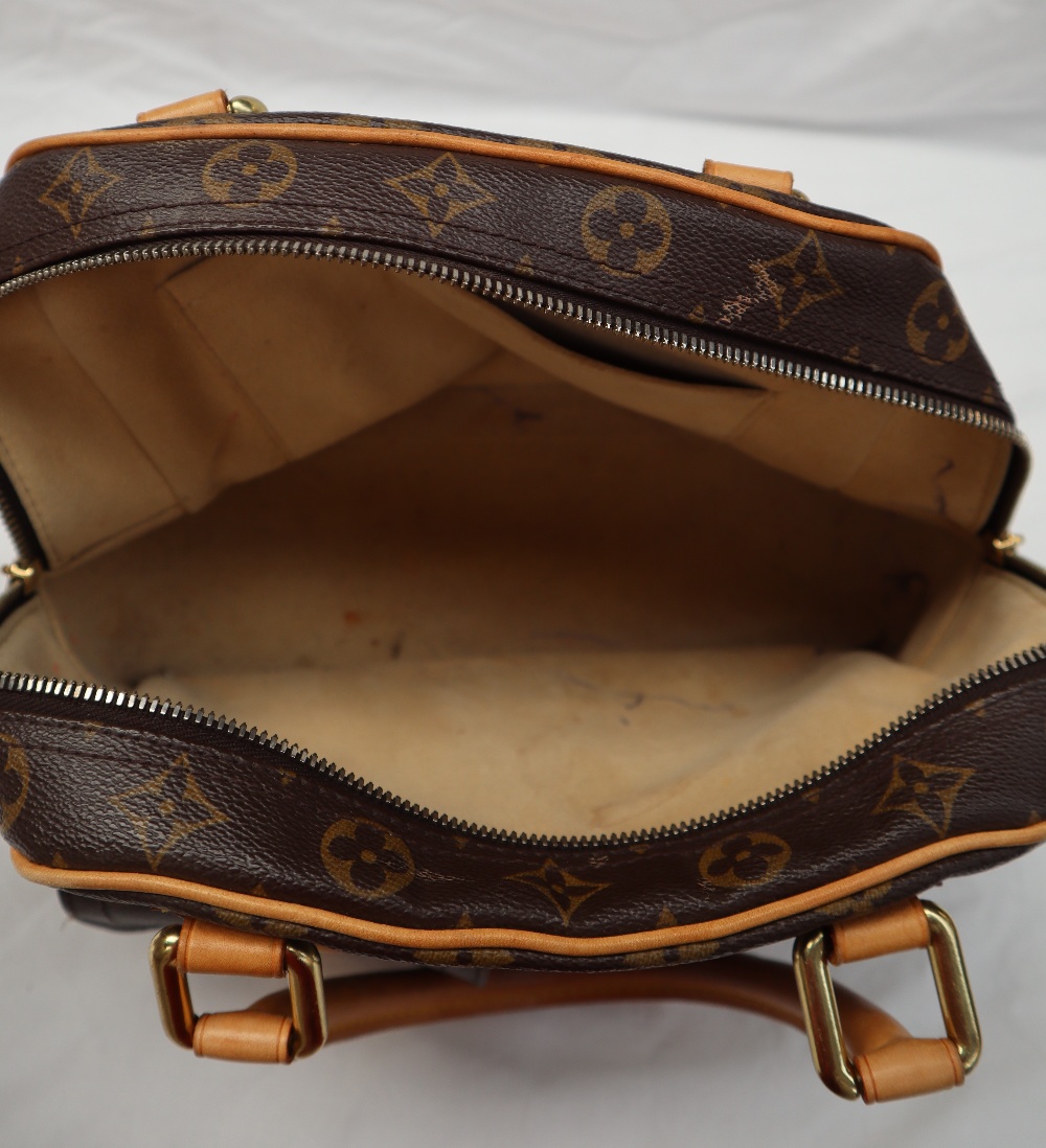 A Louis Vuitton monogram handbag, with leather handles, - Image 17 of 19