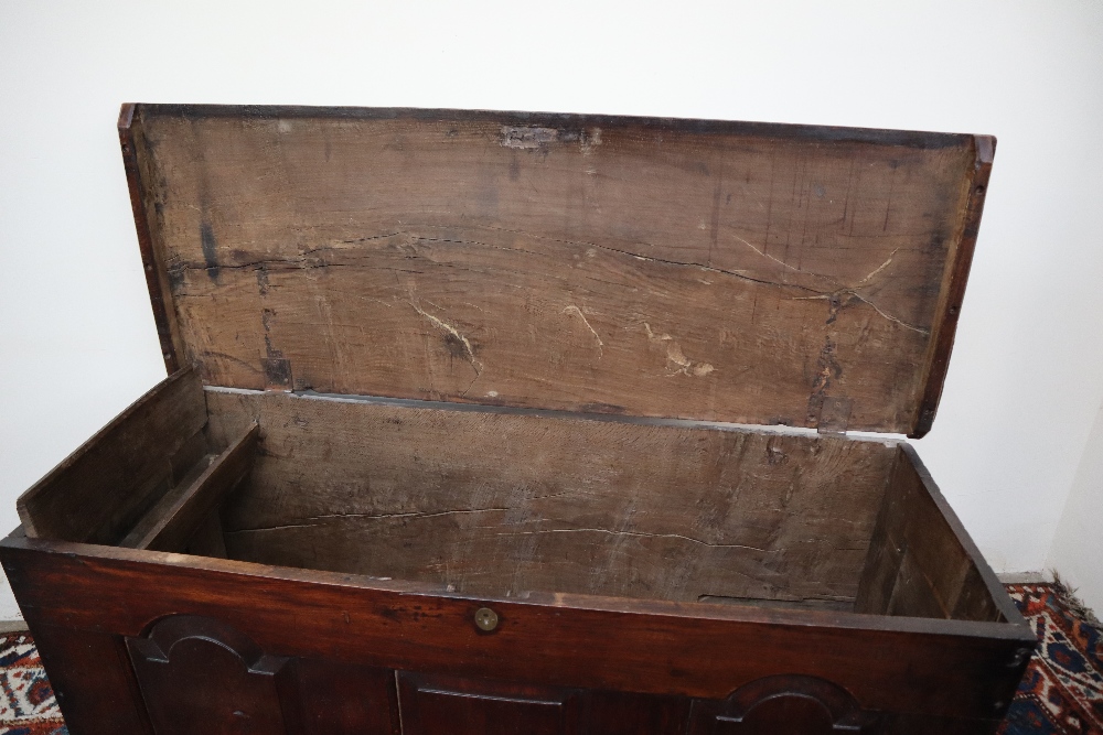 An 18th century oak coffer, the planked rectangular top above a three panelled front on stiles, - Image 5 of 5