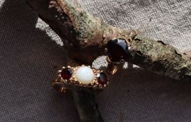 A 9ct gold opal and garnet ring,