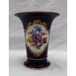 A Meissen vase of flared tapering form painted with sprays of flowers to a Royal Blue ground on a