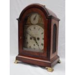 A George III mahogany Bracket Clock, with a brass carrying handle to the domed top,