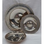 A modern silver dish of circular form with line decoration, London, 1973, 17cm diameter,