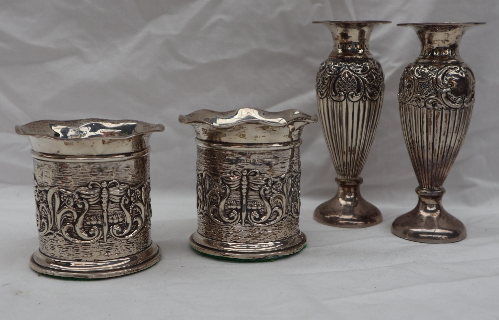 A pair of Edward VII silver vases with flared rims above a cylindrical body embossed with scrolls - Image 3 of 10