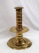 A Commonwealth / Charles II copper alloy trumpet based socket candlestick,