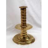 A Commonwealth / Charles II copper alloy trumpet based socket candlestick,