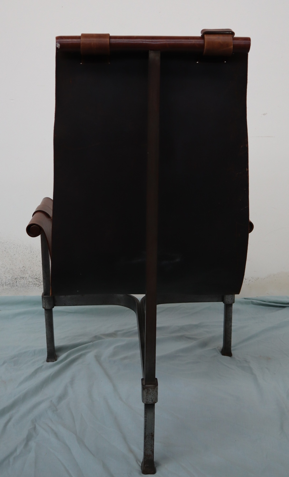 A 20th century leather and wrought iron elbow chair, - Image 4 of 7