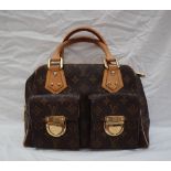 A Louis Vuitton monogram handbag, with leather handles,