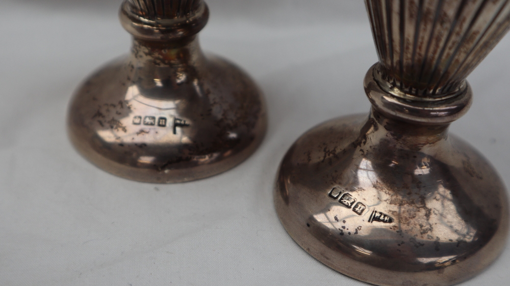 A pair of Edward VII silver vases with flared rims above a cylindrical body embossed with scrolls - Image 9 of 10