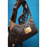 A Louis Vuitton monogram handbag,