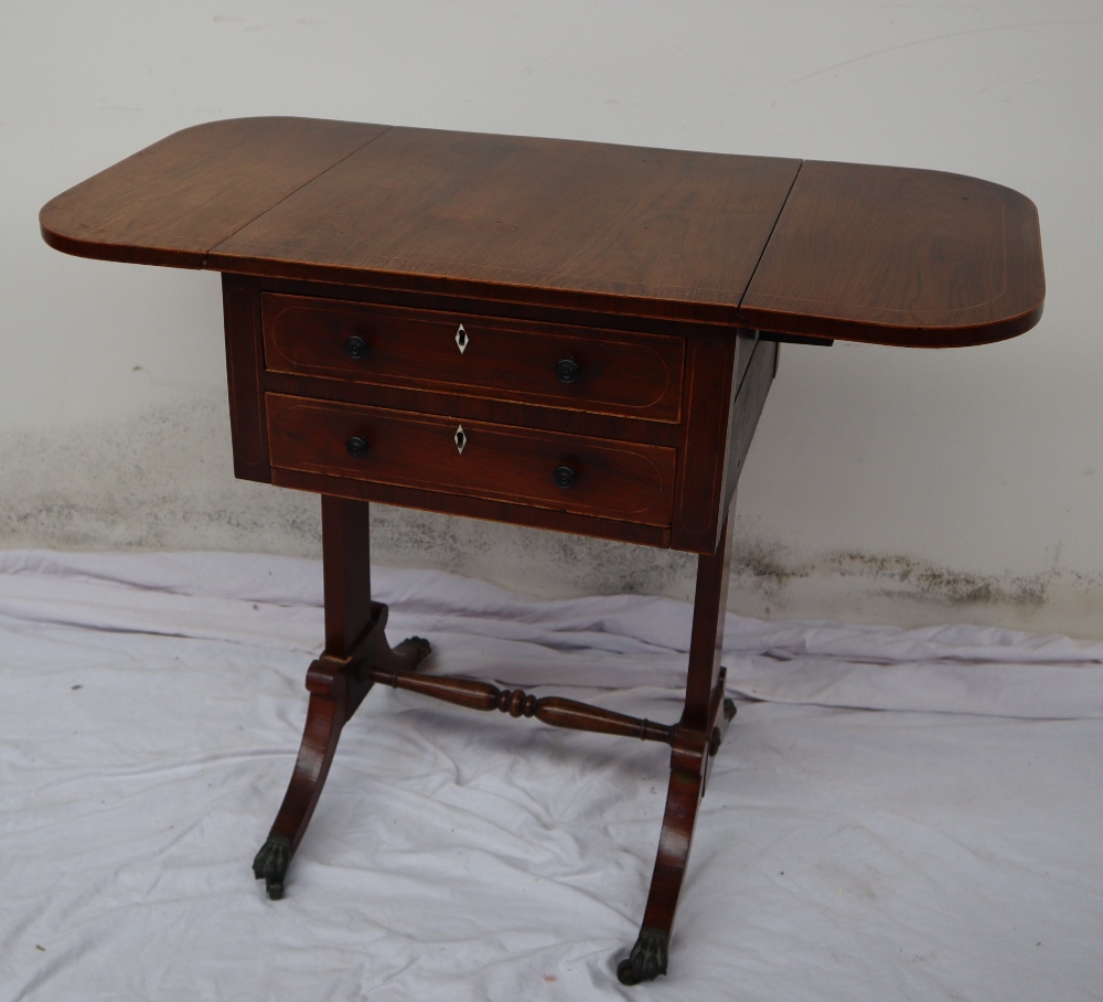 A 19th century rosewood work table,