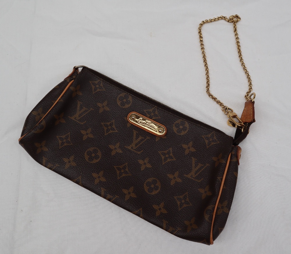 A small Louis Vuitton monogram clutch bag, with a leather shoulder strap, - Image 9 of 13