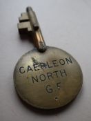 A brass Annetts Key for "CAERLEON NORTH G.