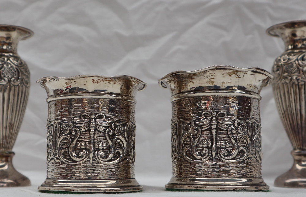 A pair of Edward VII silver vases with flared rims above a cylindrical body embossed with scrolls - Image 2 of 10