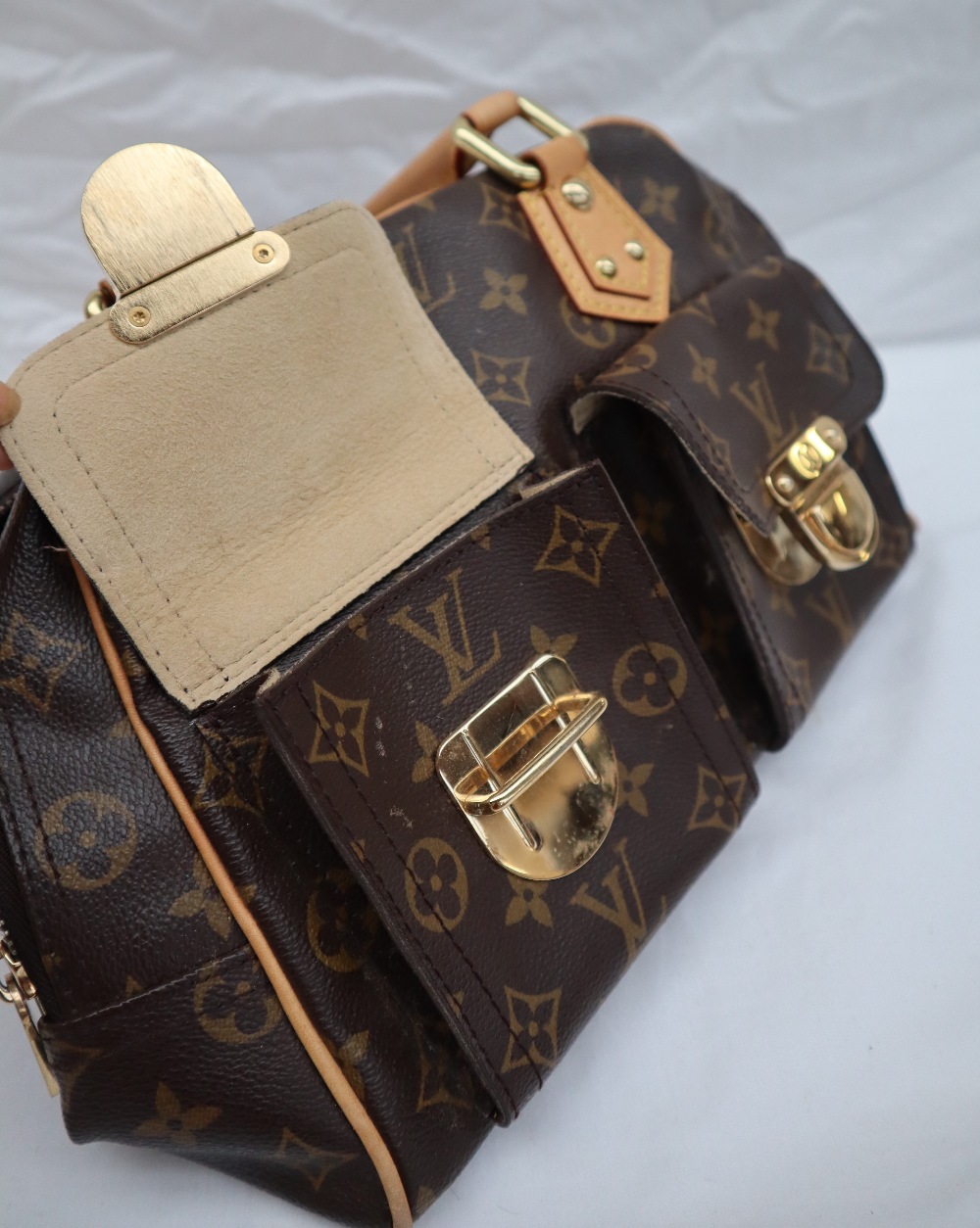 A Louis Vuitton monogram handbag, with leather handles, - Image 19 of 19