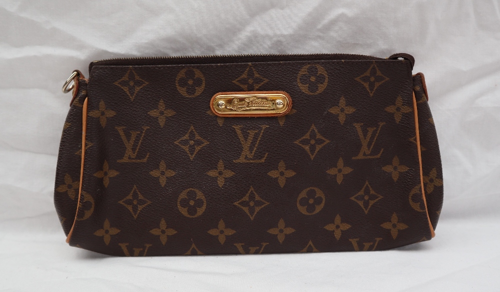 A small Louis Vuitton monogram clutch bag, with a leather shoulder strap, - Image 11 of 13