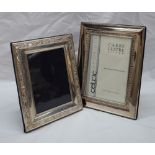 A modern silver photograph frame, of rectangular form with a Celtic pattern,