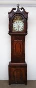 A 19th century oak and mahogany longcase clock, the hood with swan neck pediment and brass finial,