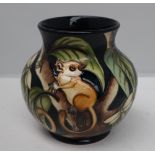 A Moorcroft pottery vase, with a flared rim, decorated in the Kirindi pattern,