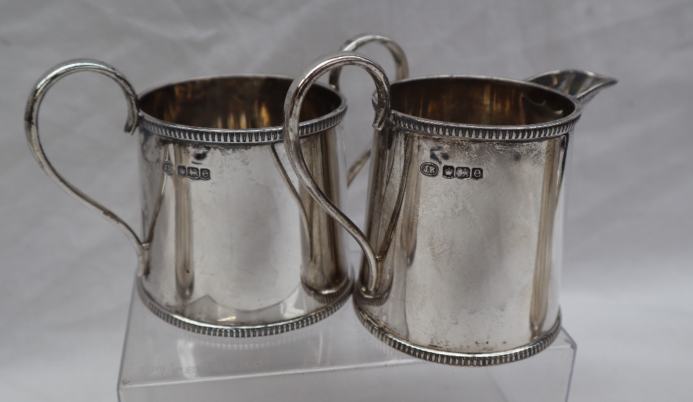 A George V silver four piece set comprising a pair of chocolate pots, - Image 3 of 15