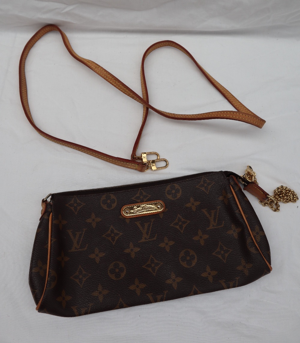 A small Louis Vuitton monogram clutch bag, with a leather shoulder strap, - Image 13 of 13