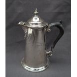 A George V silver hot water pot,