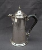 A George V silver hot water pot,