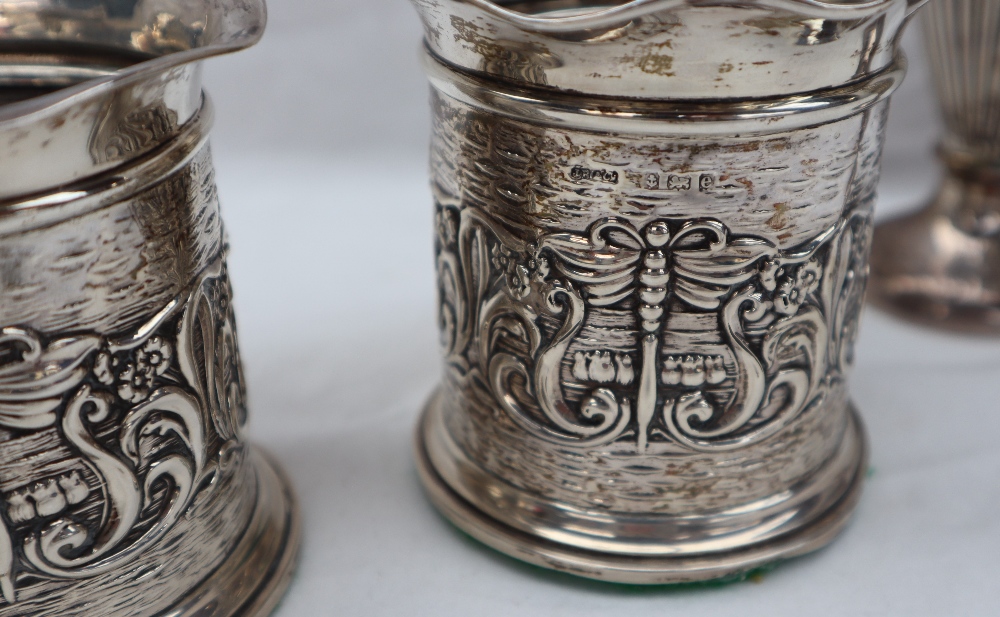 A pair of Edward VII silver vases with flared rims above a cylindrical body embossed with scrolls - Image 4 of 10