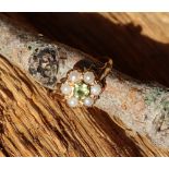 A peridot and pearl dress ring,