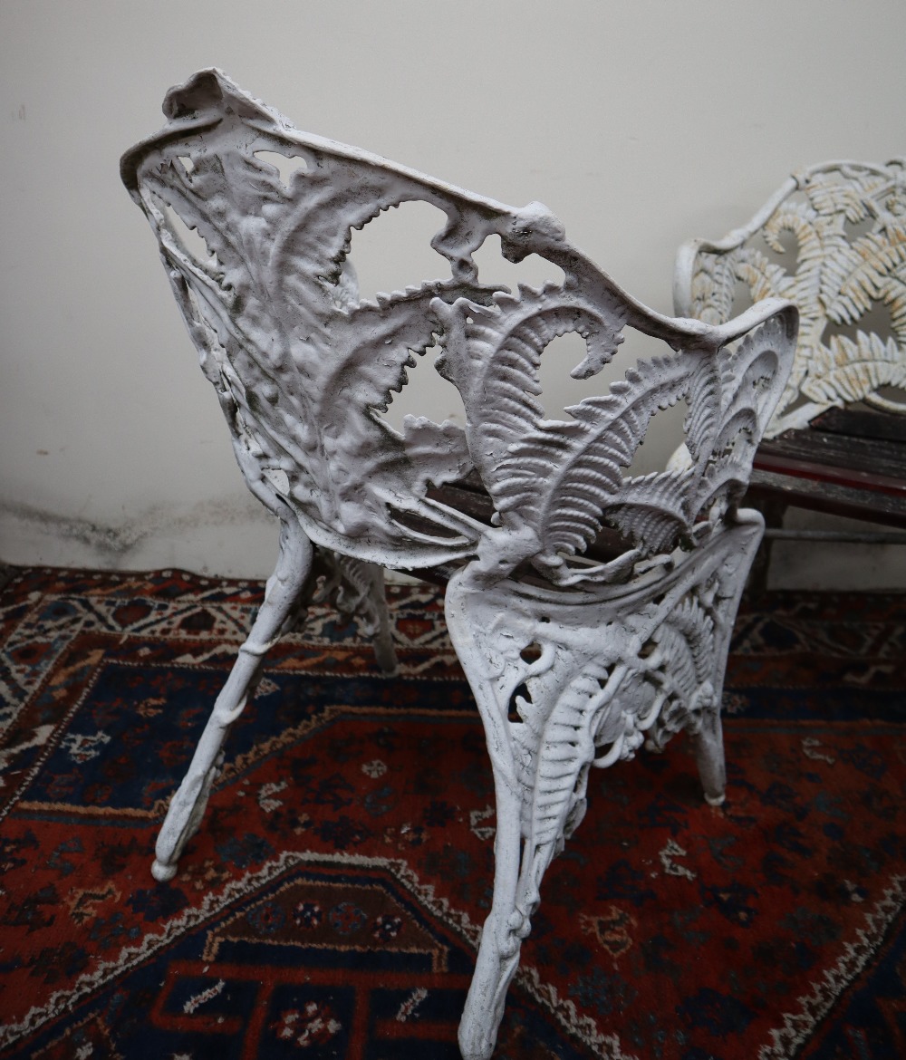 A cast iron Coalbrookdale style garden two seater bench and matching chair, - Image 3 of 9