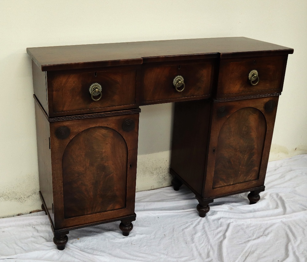 A 19th century mahogany sideboard the top with an inverted breakfront,