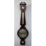 A 19th century mahogany banjo barometer, with a broken swan neck pediment, hydrometer dial,