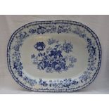 A large 19th century blue and white pottery meat plate,