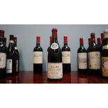 A bottle of Louis Latour Beaune Domaine 1987 together with assorted bottles of red wine including