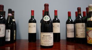 A bottle of Louis Latour Beaune Domaine 1987 together with assorted bottles of red wine including