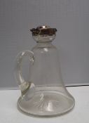 An Edward VII silver and glass claret jug,