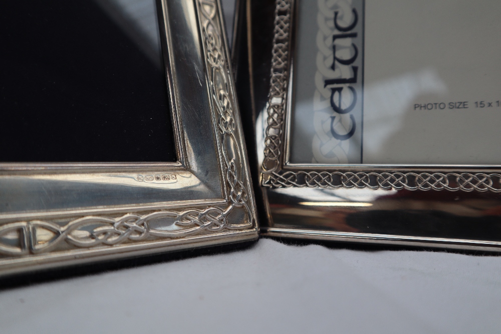 A modern silver photograph frame, of rectangular form with a Celtic pattern, - Image 2 of 3