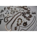 A silver slave bracelet together with silver bangles, silver earrings, pendants, necklaces,