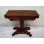 A Victorian rosewood card table, the rectangular top with rounded corners,