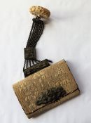 A 19th century Japanese Tobako-ire (tobacco pouch) with a carved ivory kagamibuta netsuke,