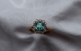 A topaz and diamond cluster ring,