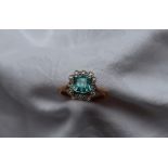 A topaz and diamond cluster ring,