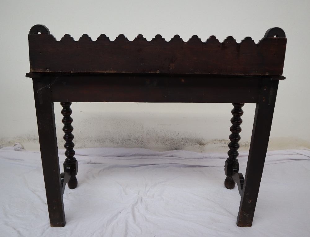 A 19th century carved oak side table, the raised back carved with arched and flowers heads, - Image 8 of 9