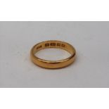 A 22ct yellow gold wedding band, approximately 4.