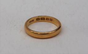 A 22ct yellow gold wedding band, approximately 4.