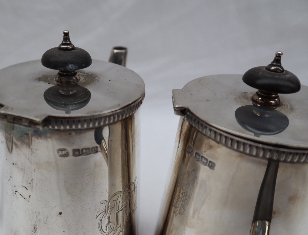 A George V silver four piece set comprising a pair of chocolate pots, - Image 8 of 15