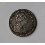A George III five shillings dollar coin,