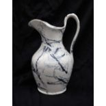 A 19th century Welsh pottery water jug, decorated in the Lazuli pattern,
